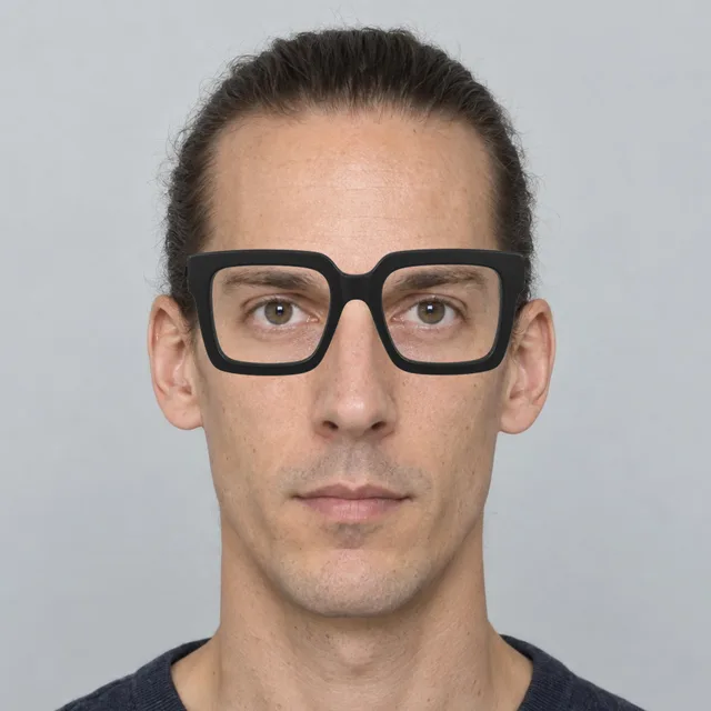 Oblong face wearing oversized square glasses